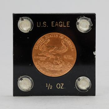 GULDMYNT, 24 k guld, 25 dollar, USA, 1986, 1/2 ounce, ca 14,17g.