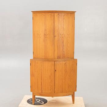 A 1950/60s pine corner cabinet.