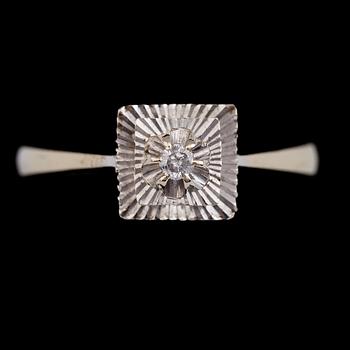 RING, 18 k vitguld med briljantslipad diamant ca 0.04 ct. Total vikt ca 3 gram.