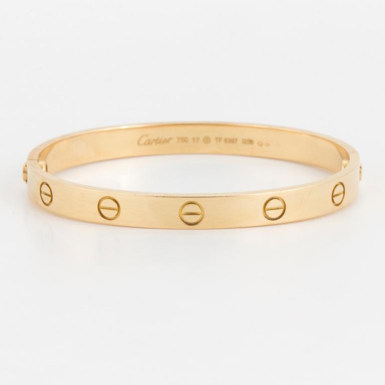 An 18K gold Cartier 'Love' bangle.