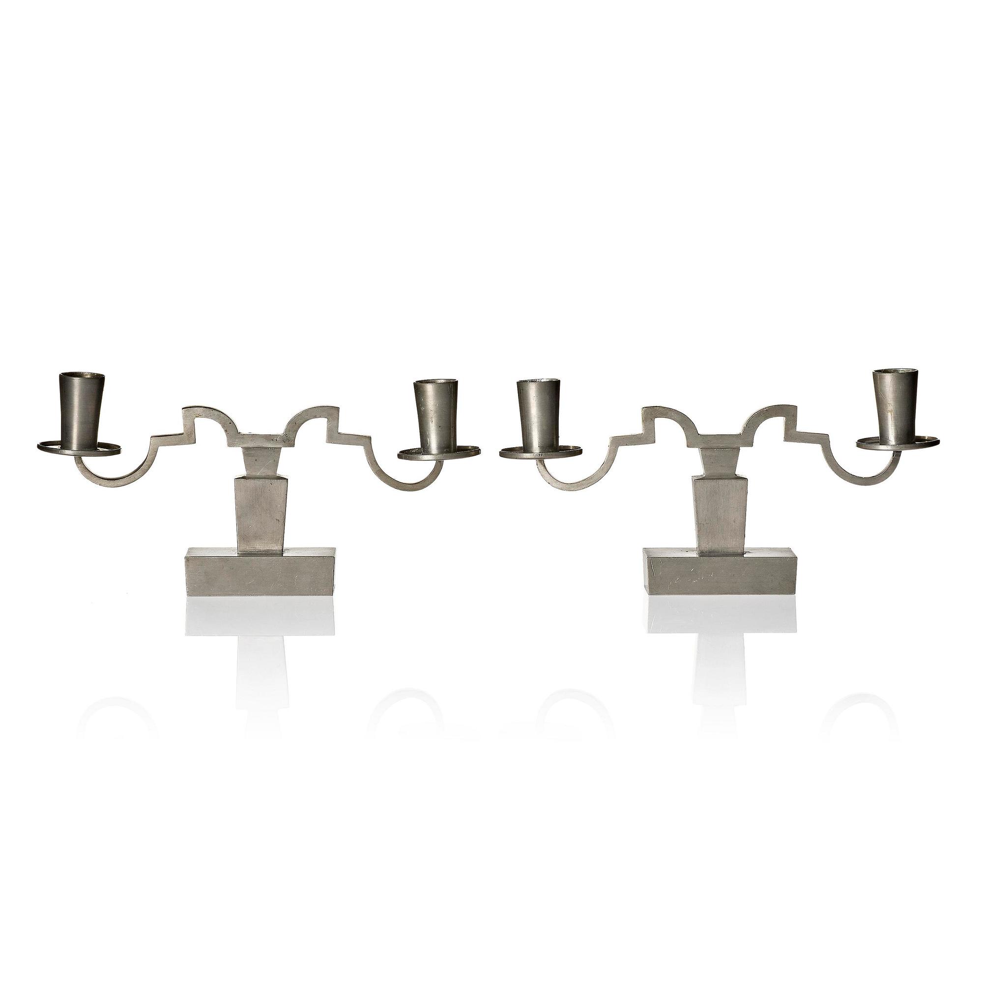 Nils Fougstedt, a pair of pewter candelabra model "A 1047", Firma Svenskt Tenn, Stockholm 1932.