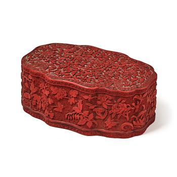 1013. A fine carved lacquer box and cover with tianqi lacquer inset boxes and covers, Qing dynasty, Qianlong (1736-95).