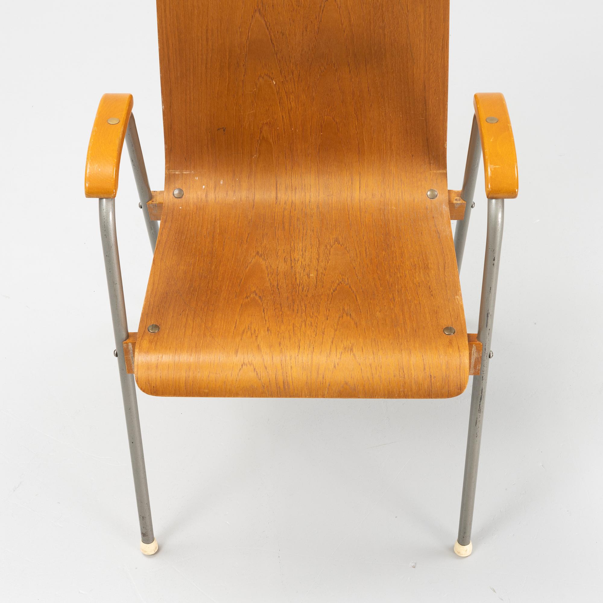 Six teak veneered armchairs, mid 20th century.