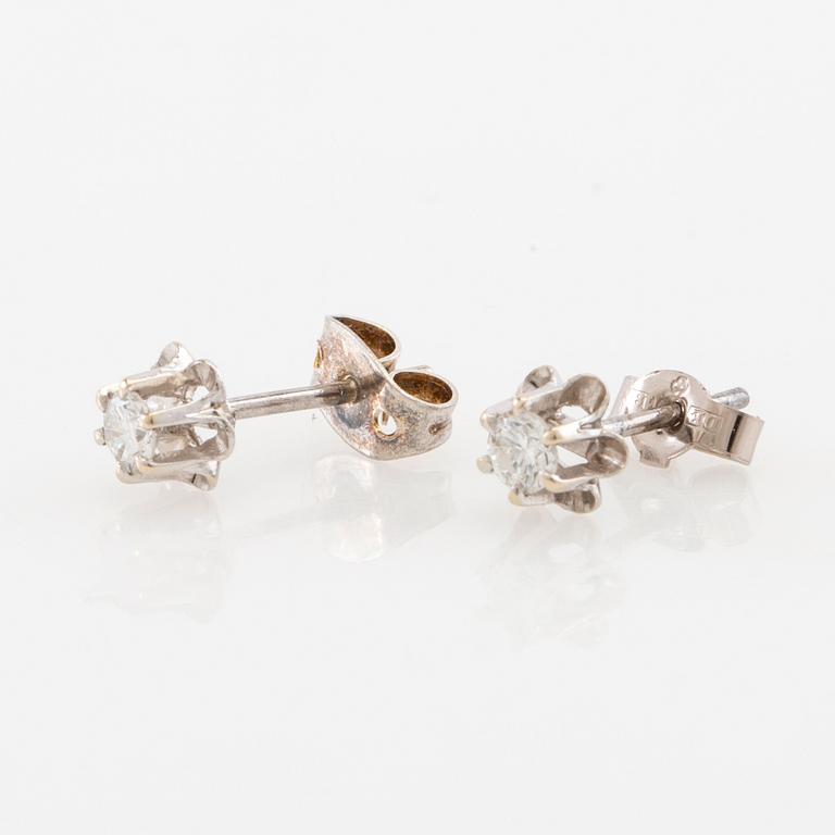 Earrings, a pair of 18K white gold set with round brilliant-cut diamonds.