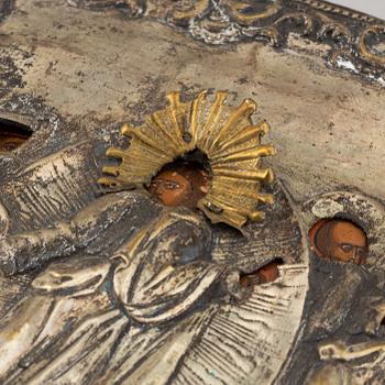 A russian icon with ochlad, rempera on panel, 19th Century.