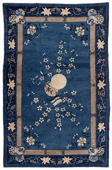 965. An antique rug, probably Beijing, northern China, around 1910, c. 235x150 cm.