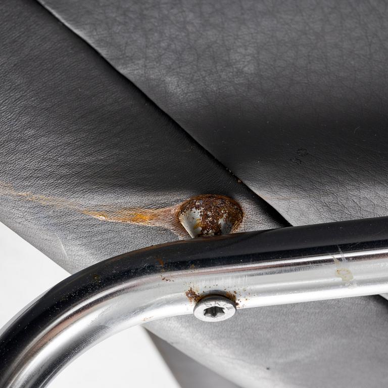 Hans J. Wegner, fåtölj med fotpall, "Ox Chair", EJ-100, Erik Jørgensen Møbelfabrik A/S, Svendborg, Danmark.