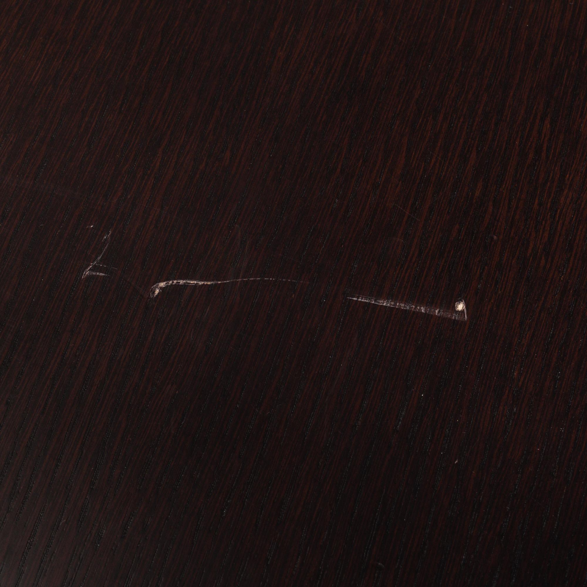 A "Athos" dining table by Paolo Piva for B&B Italia.