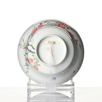 A fine famille rose ''prunus and magnolia' bowl, Qing dynasty.