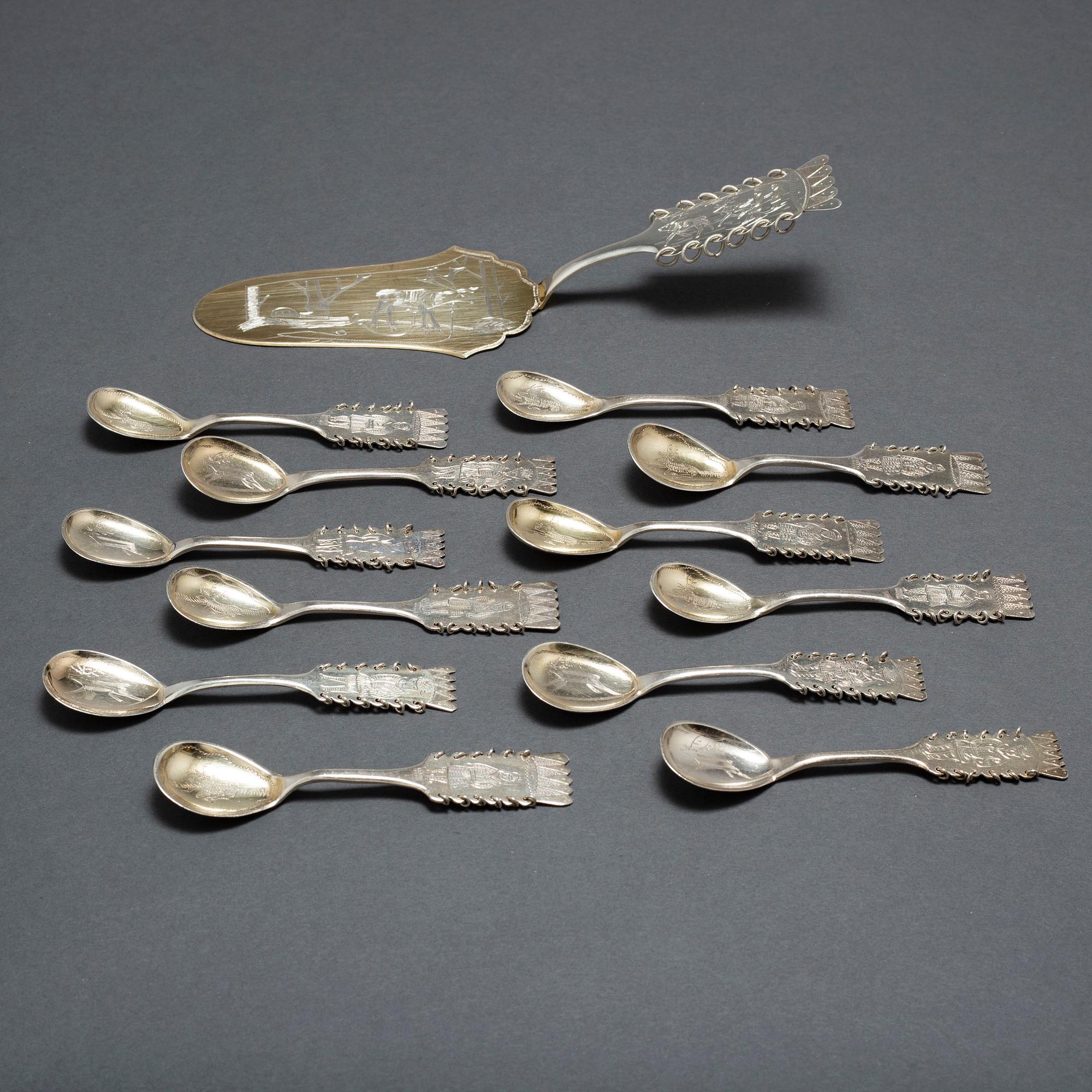 A SILVER CAKE KNIFE AND 12 COFFEE SPOONS, samian, second half of the 20th century.