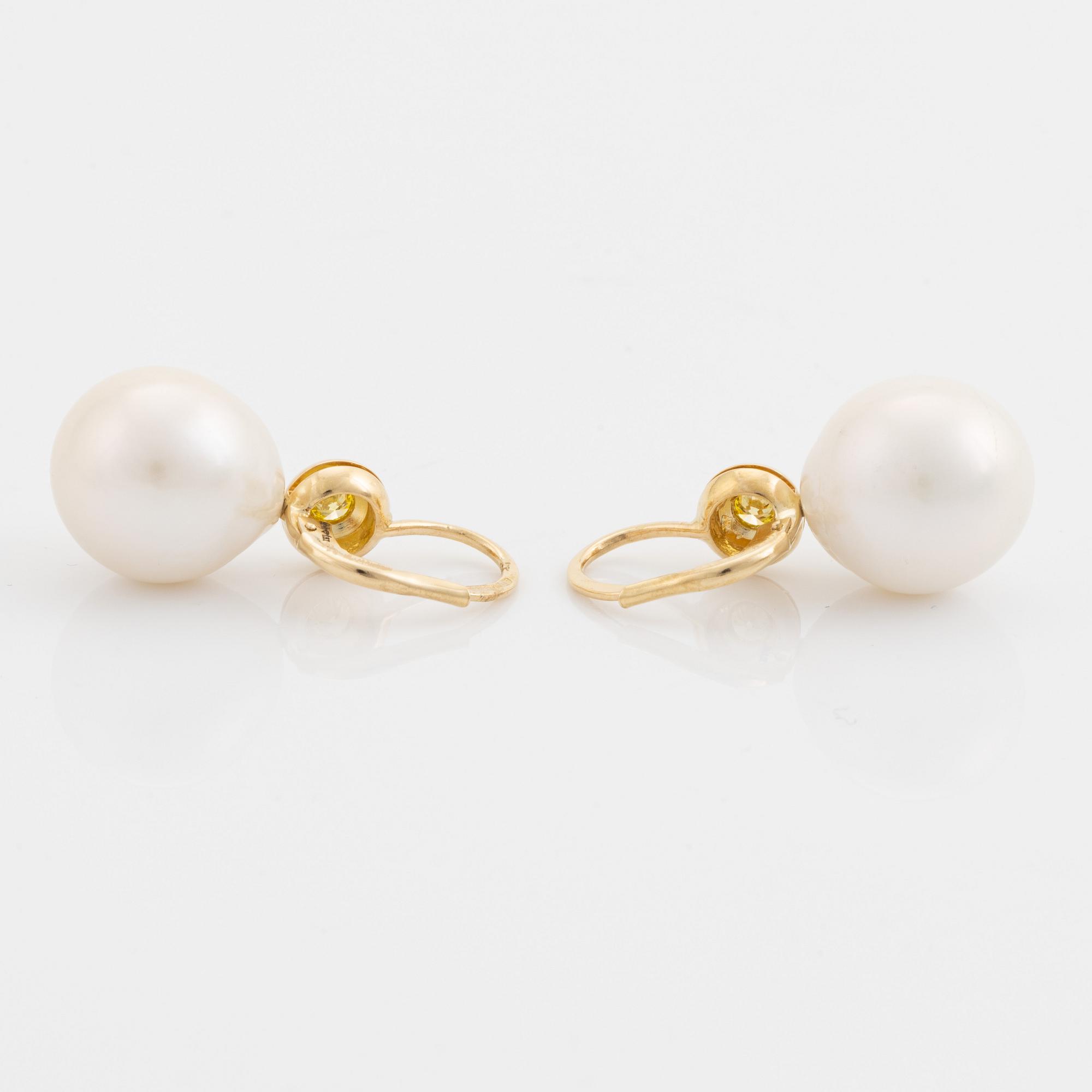 Freshwater pearl and colour treated yellow diamond earrings.