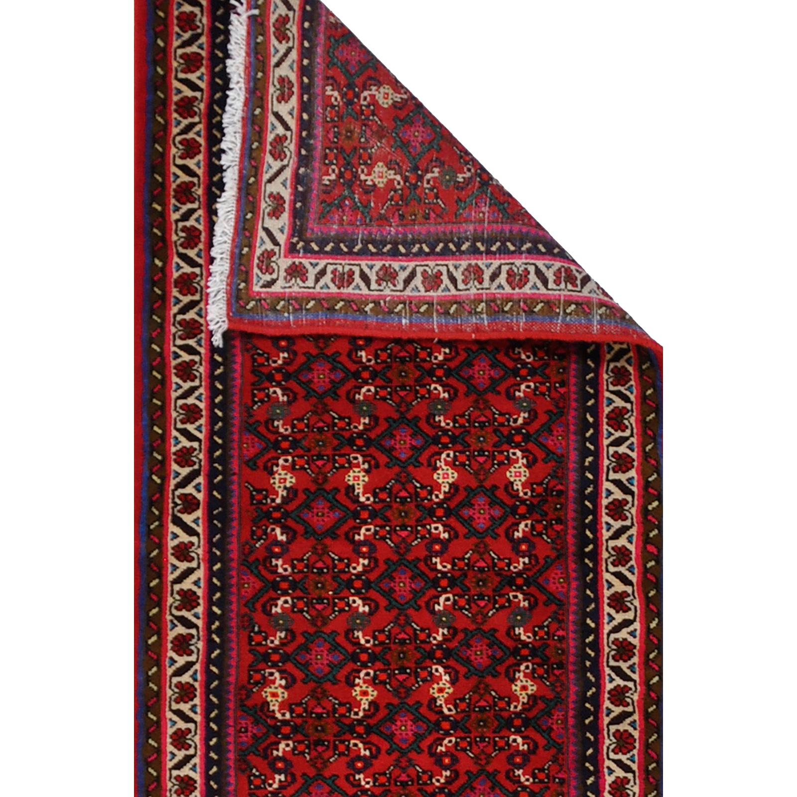 A Hosenabad runner, approximately 502 x 82 cm.