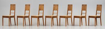 A Art Nouveau oak set with dining table, seven chairs and a side table, Finland, early 1900's.