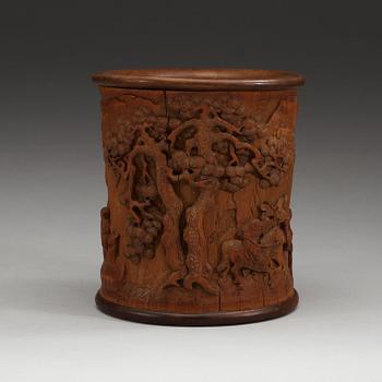 A carved bamboo brush pot, presumably late Qing dynasty (1644-1912).