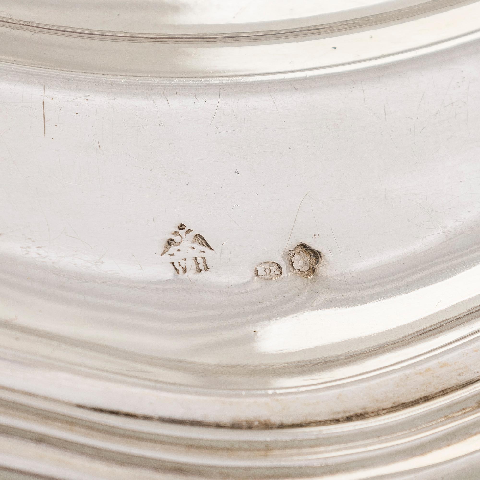 A silver serving platter, and six similar coasters, Austria-Hungary 1867-1922 and Czechoslovakia 1949-1962.