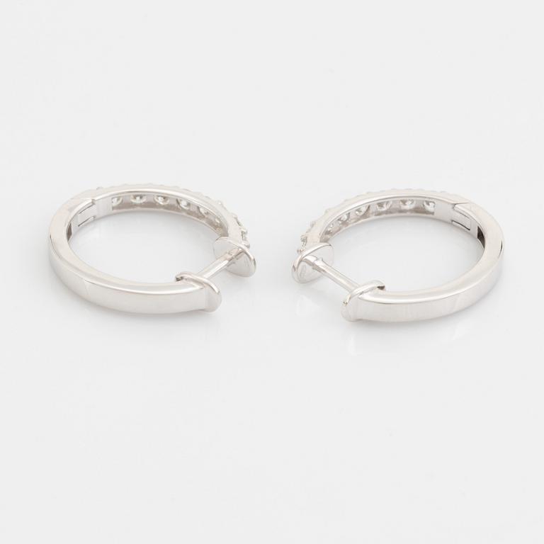 Brilliant cut diamond hoop earrings.