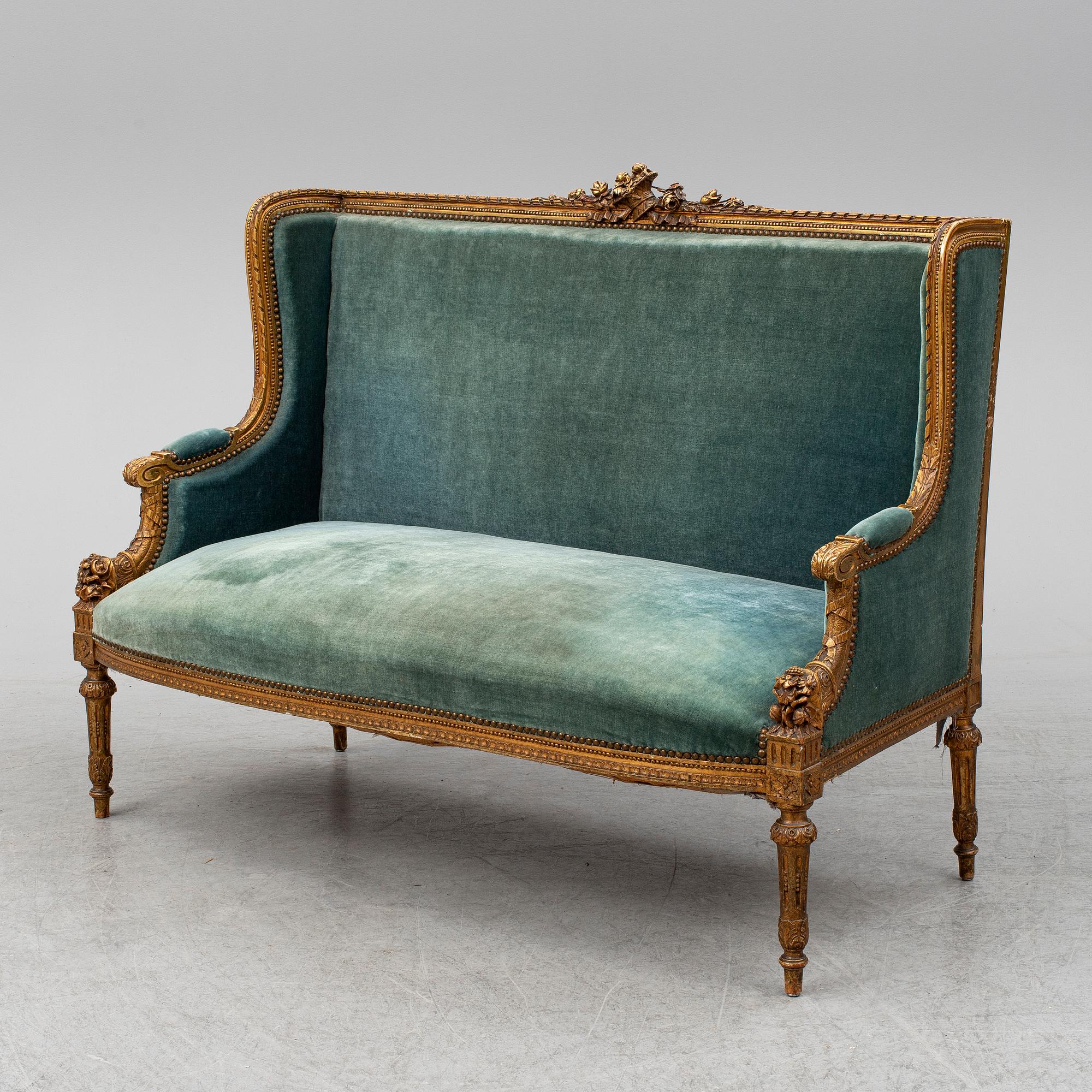 A Louis XVI-style sofa, ca 1900.