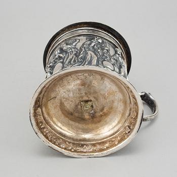 A silver baroque style tankard.