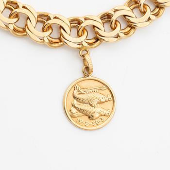 Bracelet, 18K gold, with charms including zodiac signs.