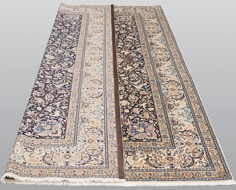A Nain carpet, part silk, so-called 6 LAA, approx. 324 x 210 cm.