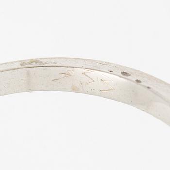 Ring in white gold with a navette-cut diamond and octagon-cut diamonds.