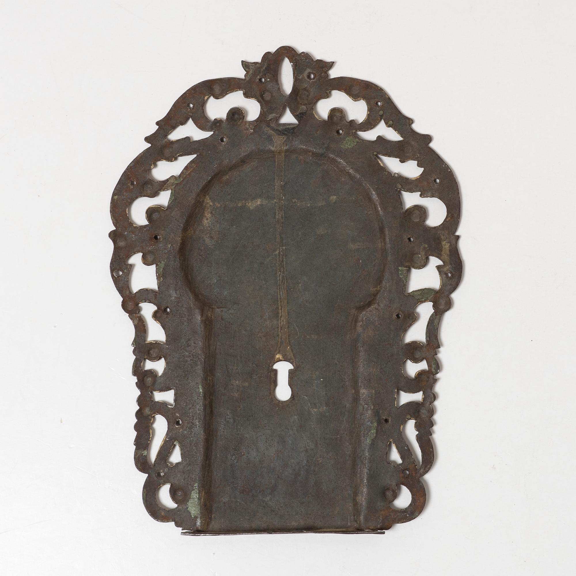 A Swedish baroque polychrome painted wrought-iron key mount, early 18th century.