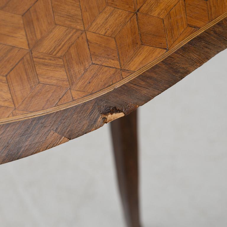 A Louis XV-style sewing table, 19th century.