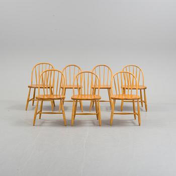 Seven matched mid 20th Century birch and beech chairs.