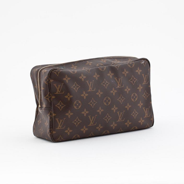 LOUIS VUITTON, a monogram canvas toiletry case.