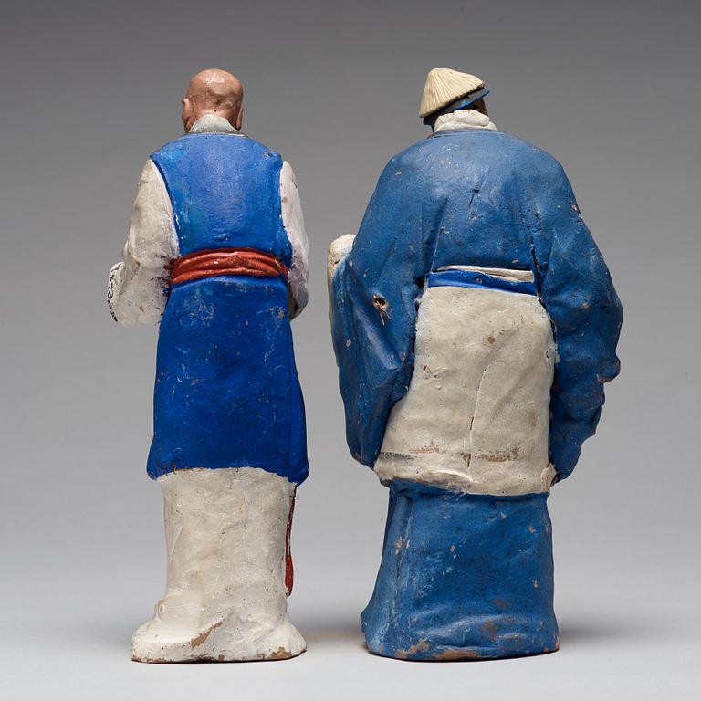 Two clay figures of chinese men, Qing dynasty, 19th Century.