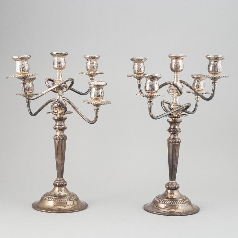 A pair of Louis XVI-style silver candelabra, 20th century marked Mexico.