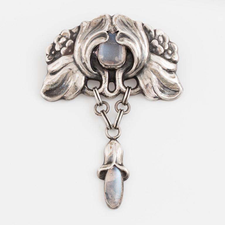 A Bernhard Hertz, silver and moonstone brooch,