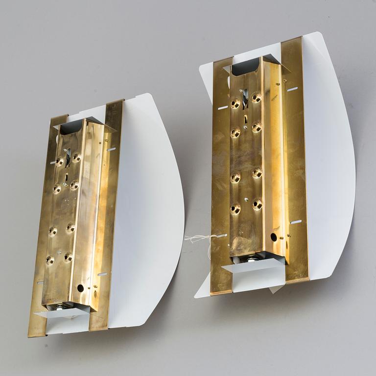 A pair of late 20th century brass wall lights for Ateljé Lyktan Åhus, Sweden.