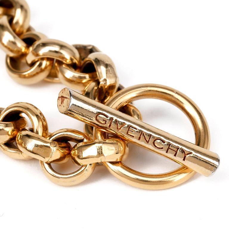 GIVENCHY, a gold colored metal chain necklace.
