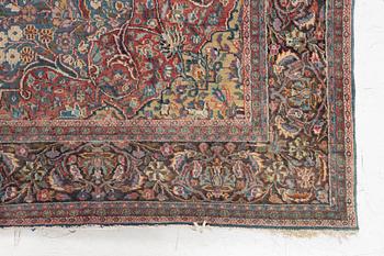 A semi-antique Khorasan rug, east Persia, c. 242 x 140 cm.