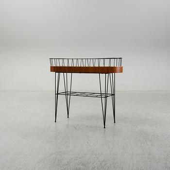 A 1950-60s plant stand.
