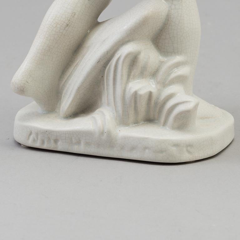 A Nils E. Hansson creamware figure figure, Gefle, Sweden 1936-52.