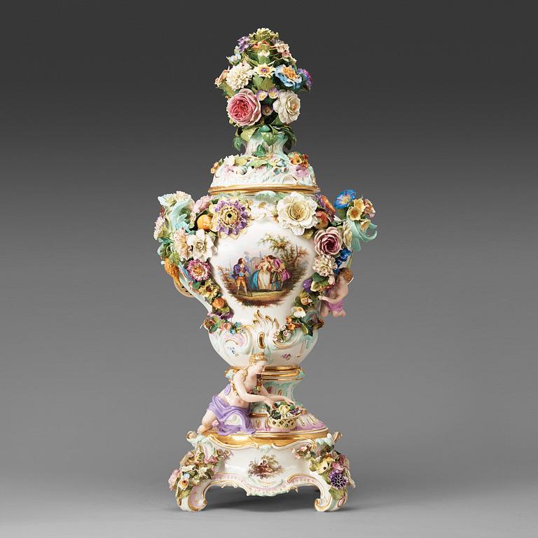 A large Meissen porcelain flower-encrusted pot-pourri vase, cover and stand, late 19th century.