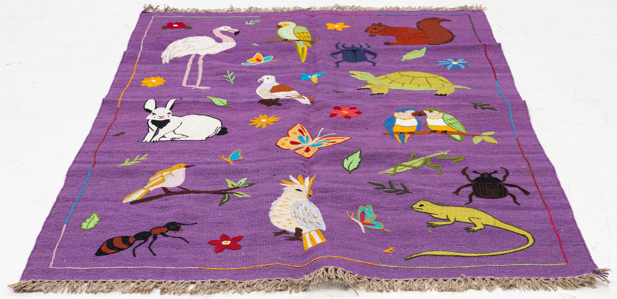 A hand-embroidered Kelim rug, c. 177 x 123 cm.