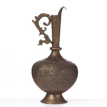 A ROYAL JUG, brass, India second half of the 19th century, height ca 39,5 cm.