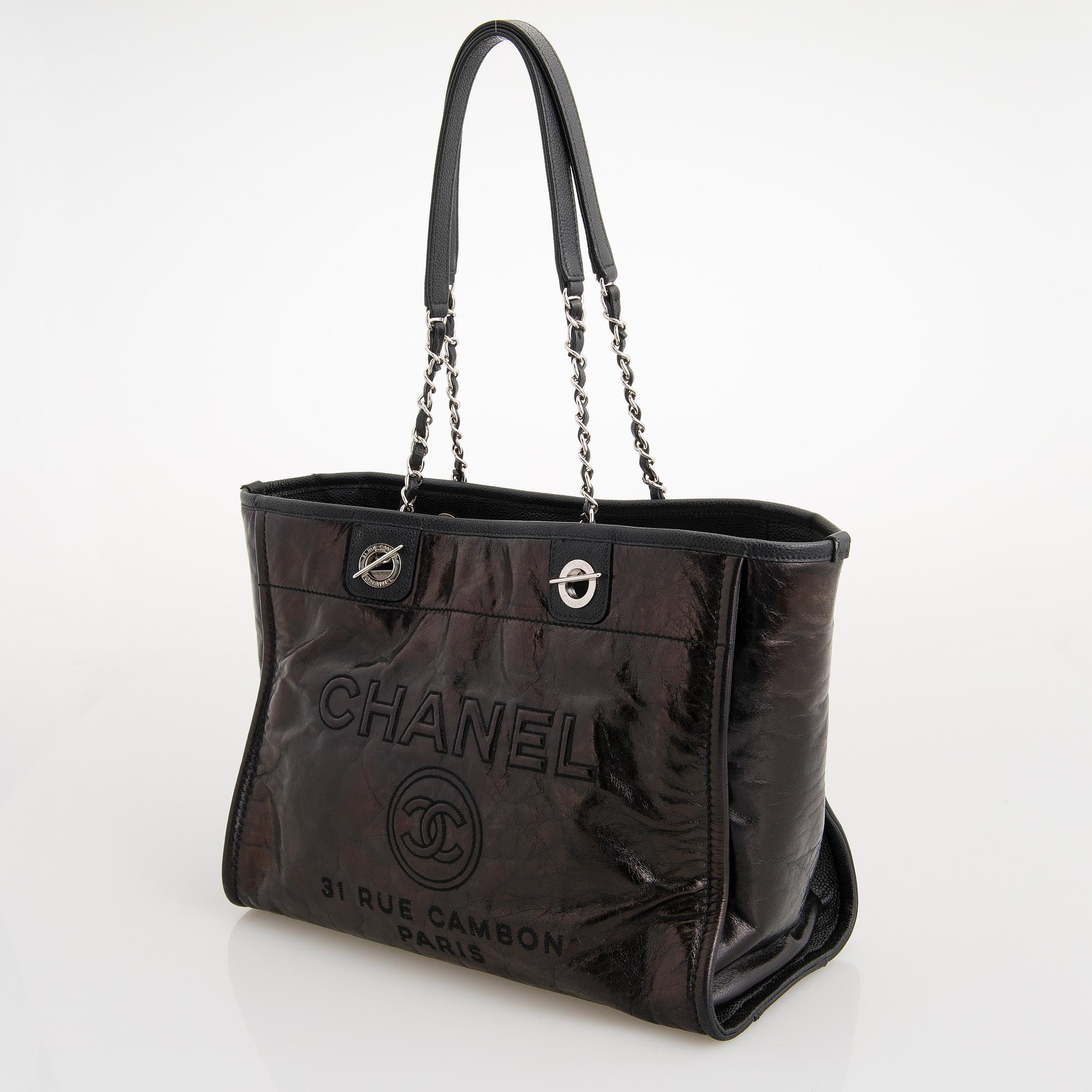 CHANEL, A Large Black Leather Shopping Bag.