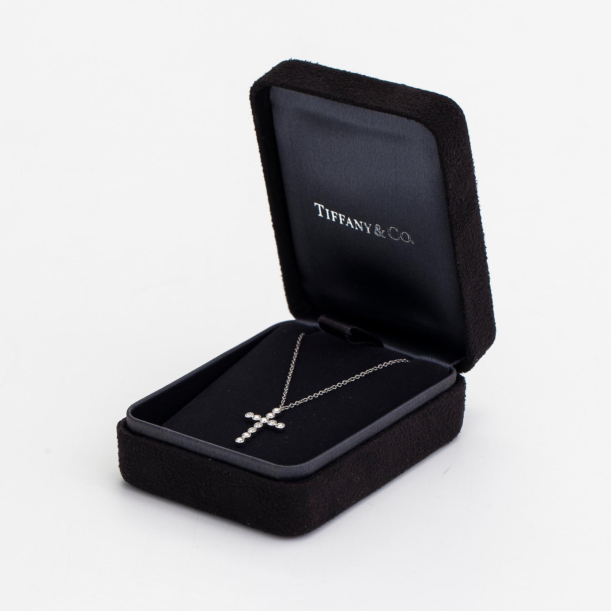 Tiffany & Co, a platinum necklace, 'Jazz Cross' with diamonds approx 0.20ct in total.