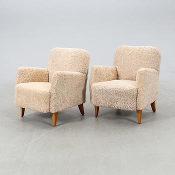 Armchairs, a pair from the 1940s.