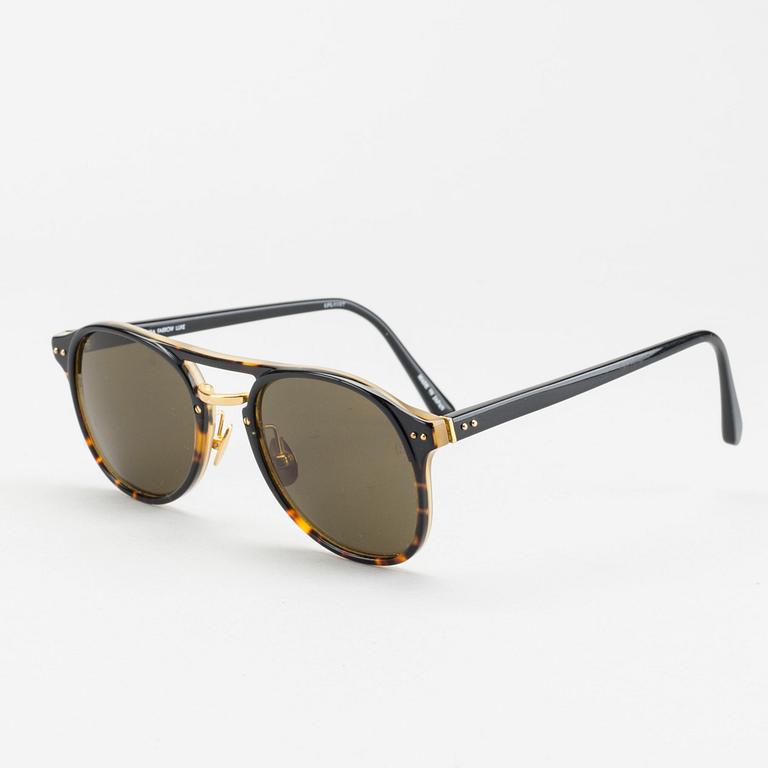 Sunglasses by LINDA FARROW LUXE.