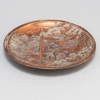 A Japanese copper dish, 20th century.