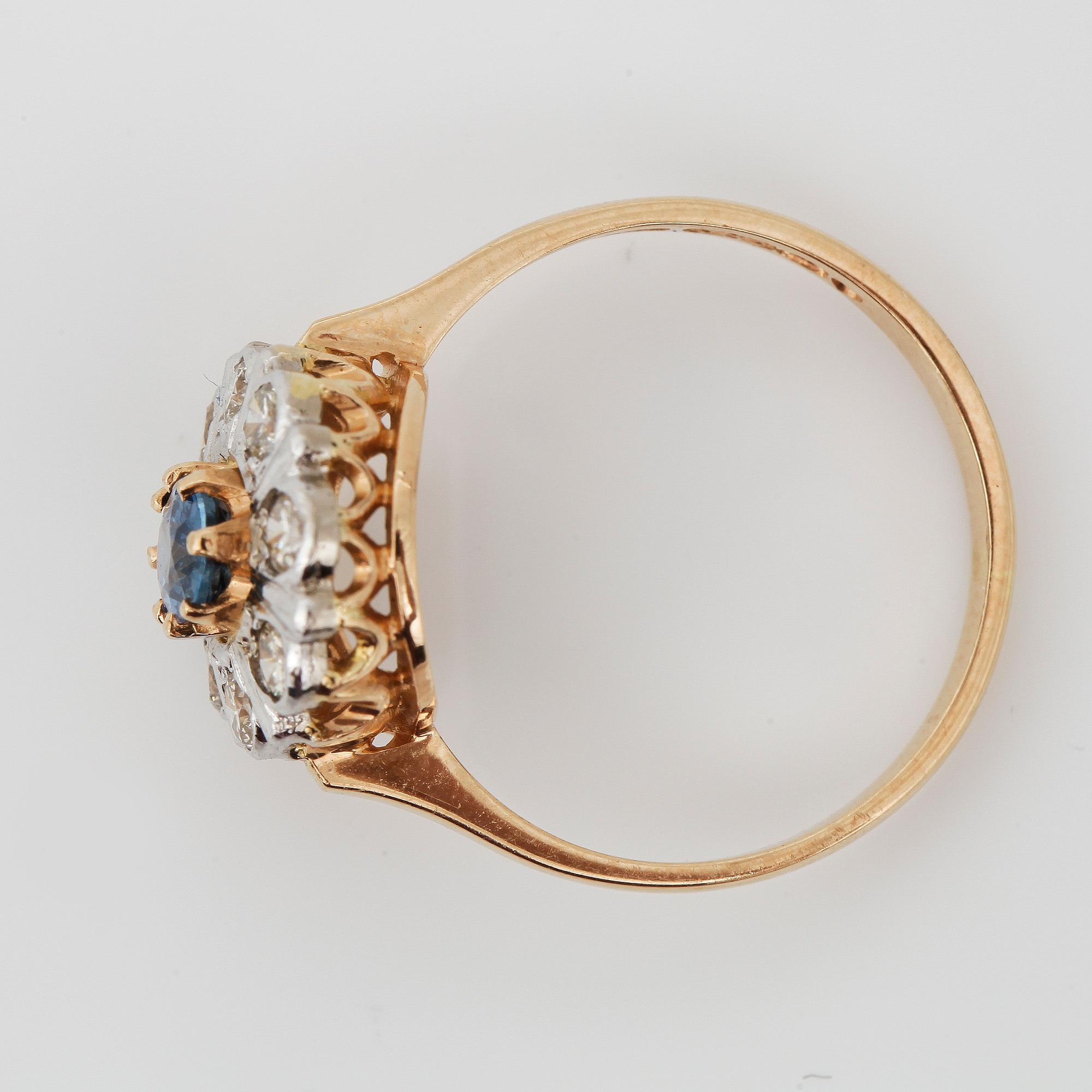 RING, 14K guld med safir ca 6x4 mm och diamanter tot ca 0,4 ct, Finland . Vikt 3, 1 g.