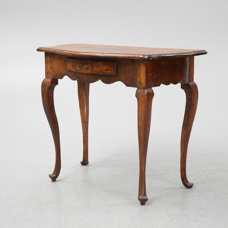 A rococo style side table, from around the year 1900.