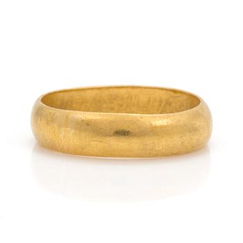 A 23K gold ring.