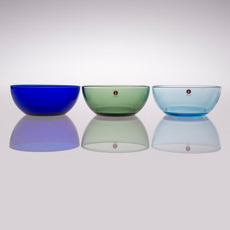 A set of 22 glass dessert bowls in three colours, Iittala, Finland, late 20th century.