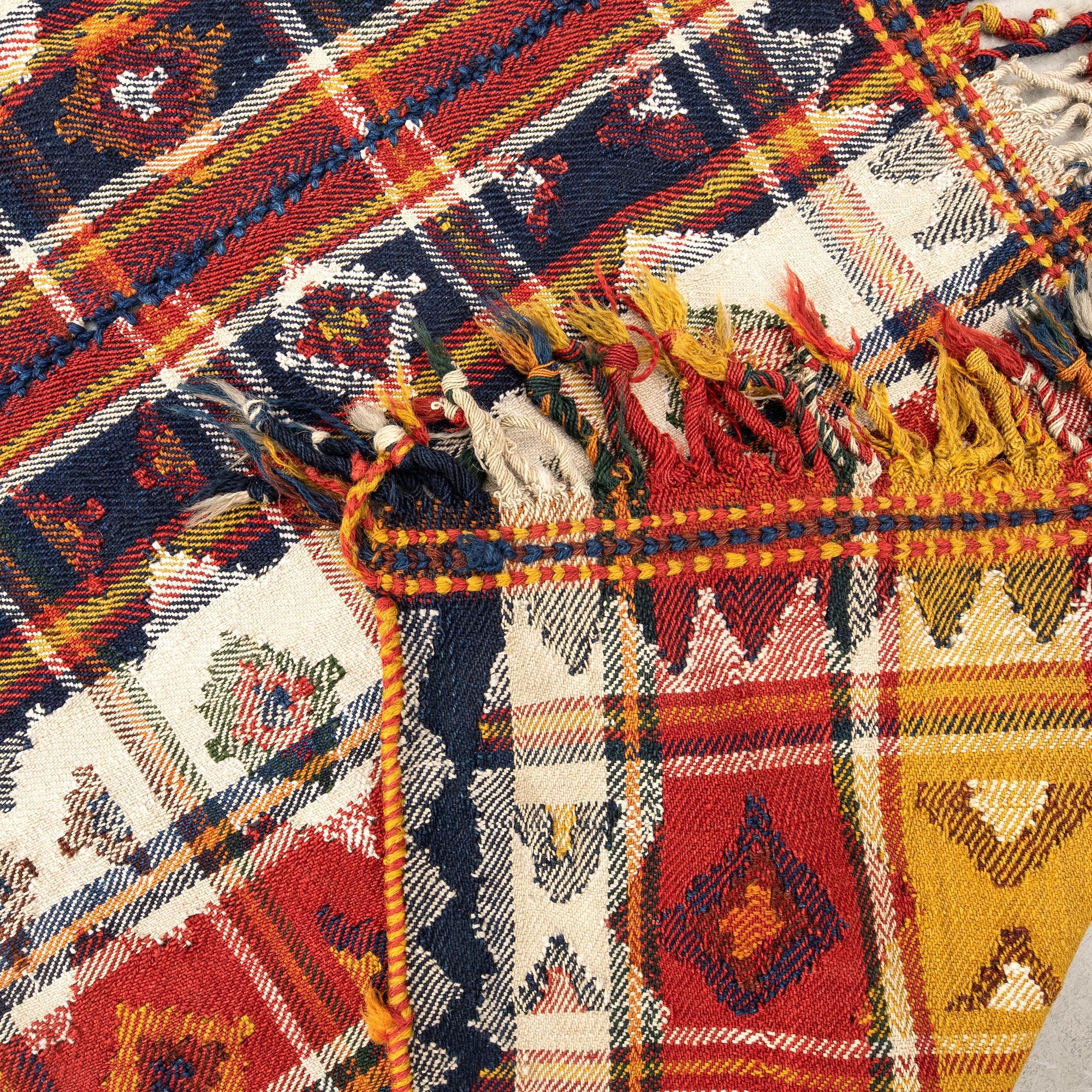 Kashgai rug semi-antique, two joined pieces, approximately 338x140 cm (without tassels).